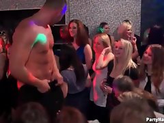 Redheaded slut sucks dick at the club
