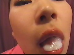 Japanese gets a load in her mouth and spits it in her hand