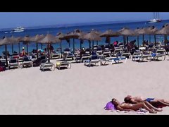 Beach sun bathing couple